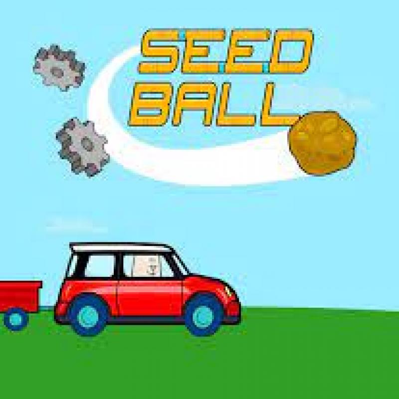 Seed Ball text with red car driving on green grass